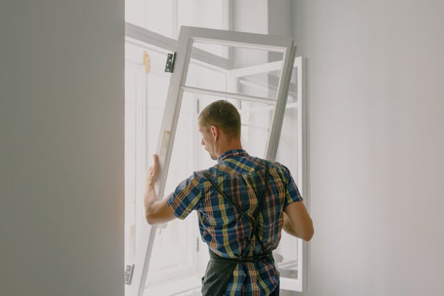 Person installing windows